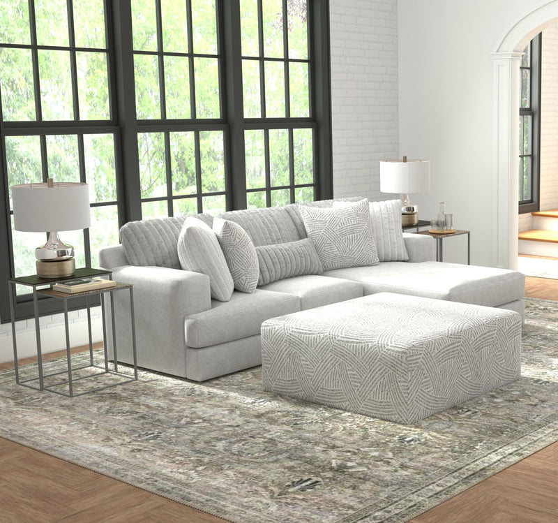 Logan - Upholstered Sectional With Comfort Coil Seating - 46" Cocktail Ottoman And Accent Pillows Included